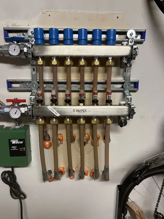 Plumber performing Gas Leak Detection at a residential property in Madisonville